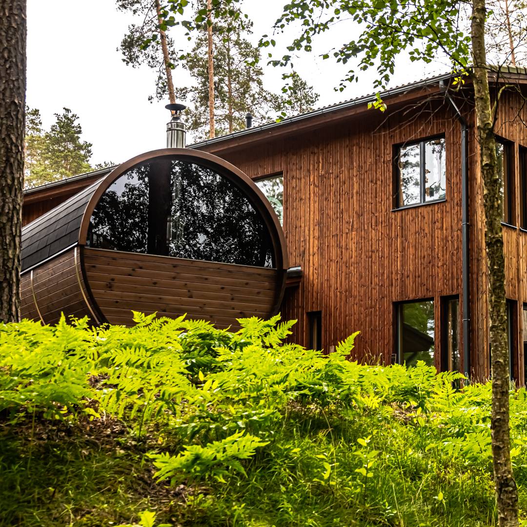 Barrel 250 outdoor sauna in a garden