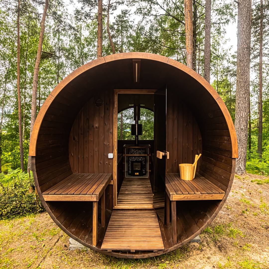 Barrel 250 outdoor sauna in a garden