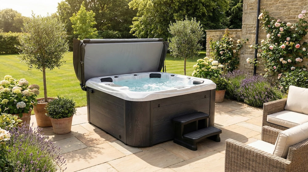clearance hot tub in a garden setting with plants and a chair.