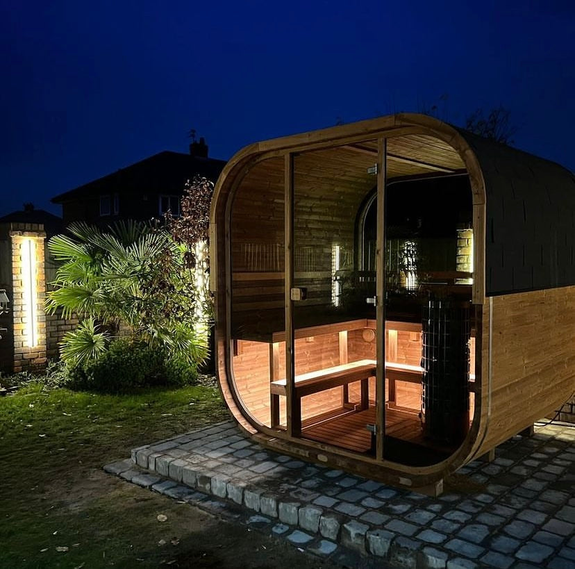Cube 250 outdoor sauna in a garden