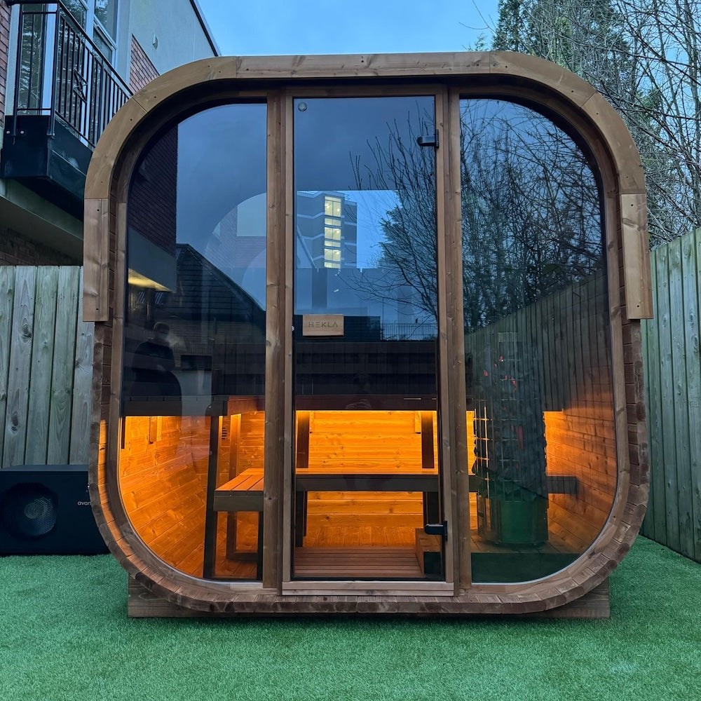 Cube 250 outdoor sauna in a garden
