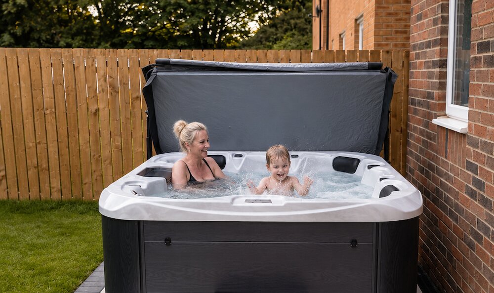 Woman and child in a hot tub