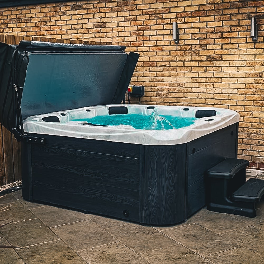 Retreat Plus plug and play hot tub in a garden