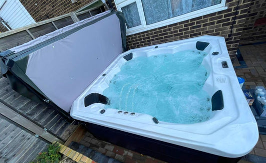 How to Lower the Bromine or Chlorine Level in a Hot Tub