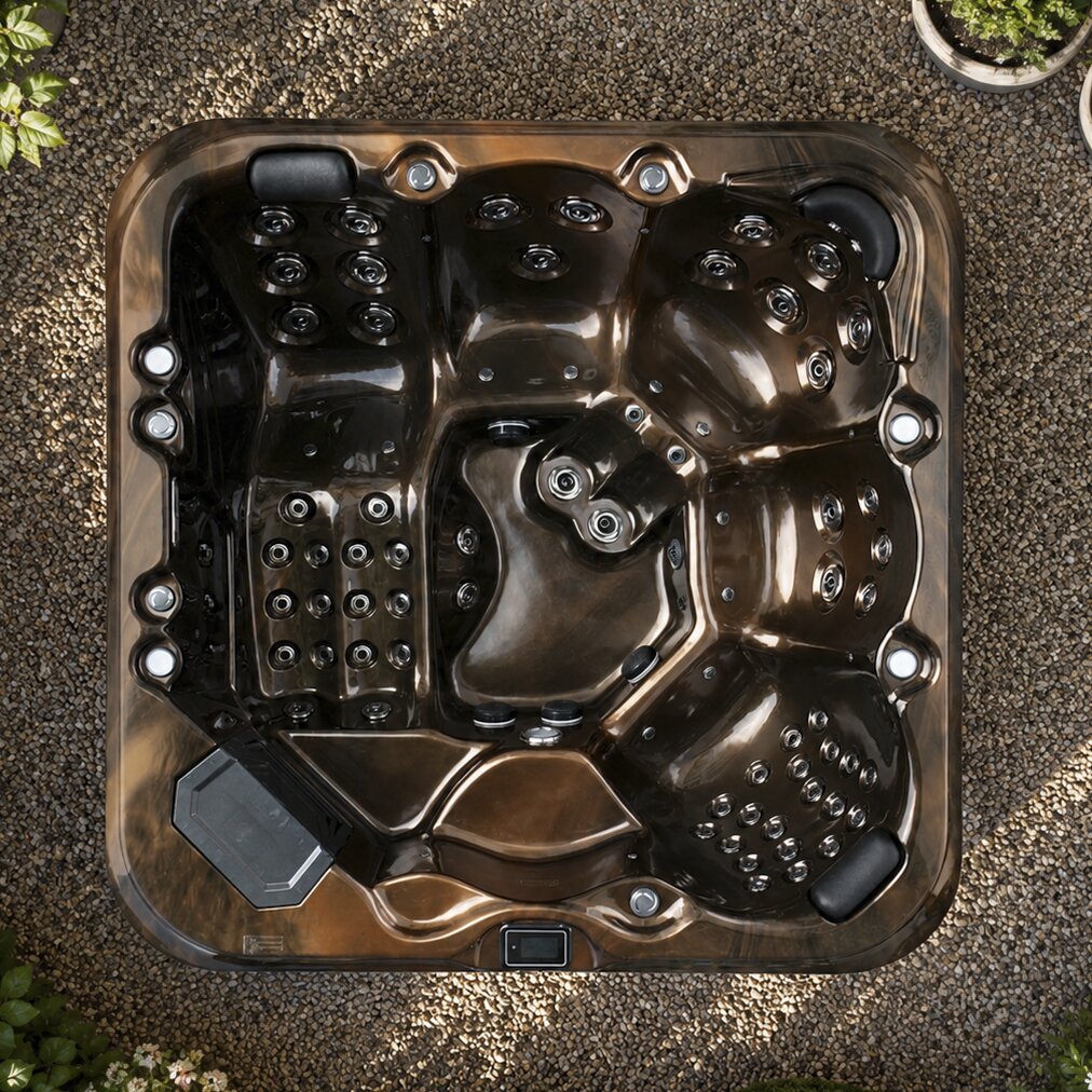 Top-down view of a hot tub on a gravel surface