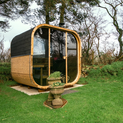 Cube 250 outdoor sauna in a garden