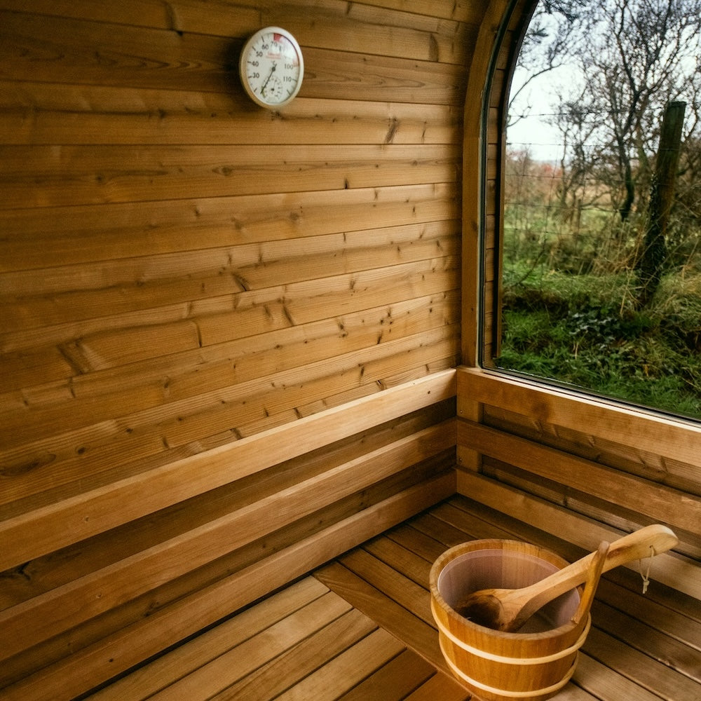 Cube 250 outdoor sauna in a garden