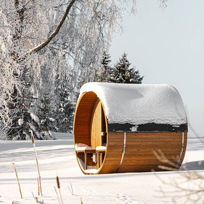 Barrel 210 outdoor sauna in a garden