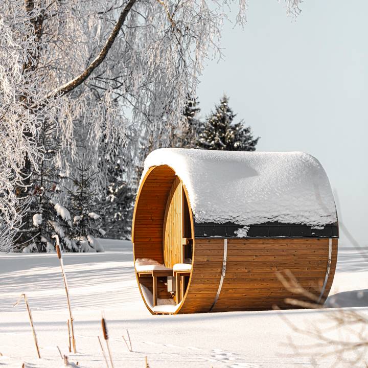 Barrel 210 outdoor sauna in a garden