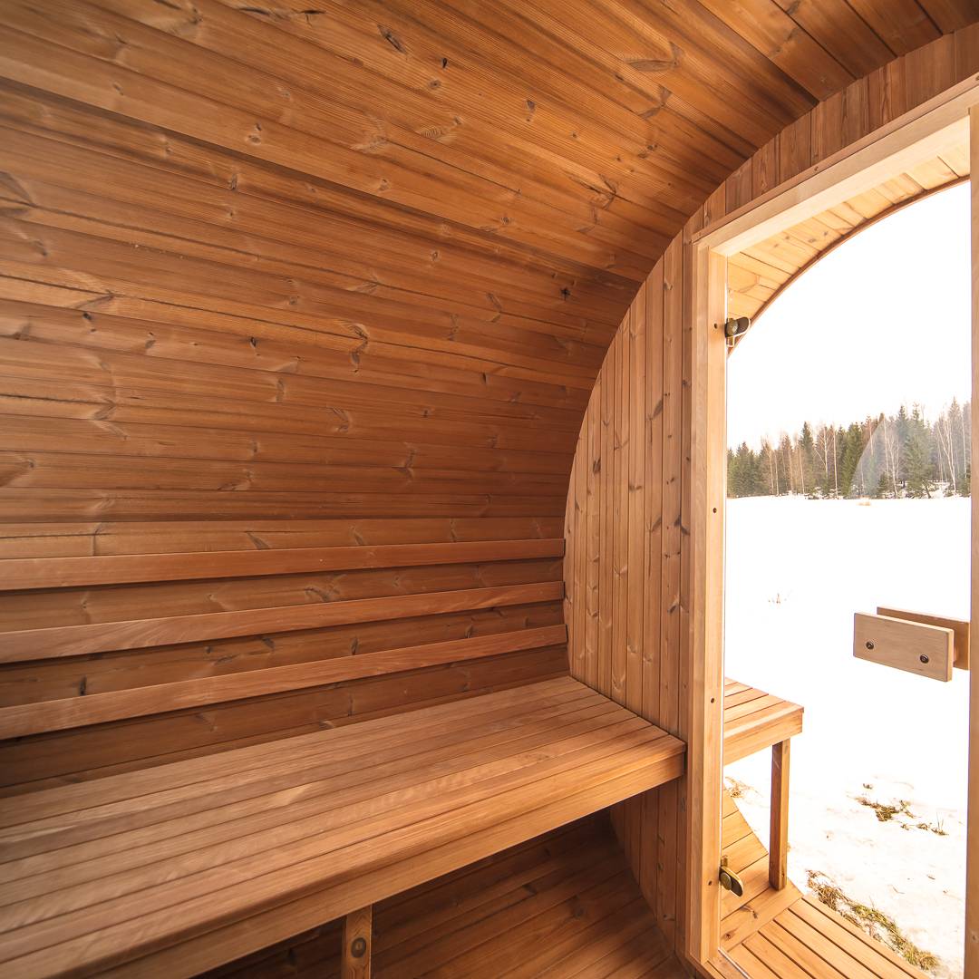 Barrel 250 outdoor sauna in a garden