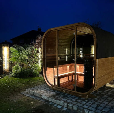 Cube 250 outdoor sauna in a garden