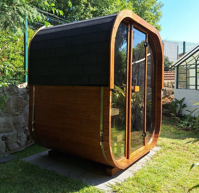 Cube 250 outdoor sauna in a garden