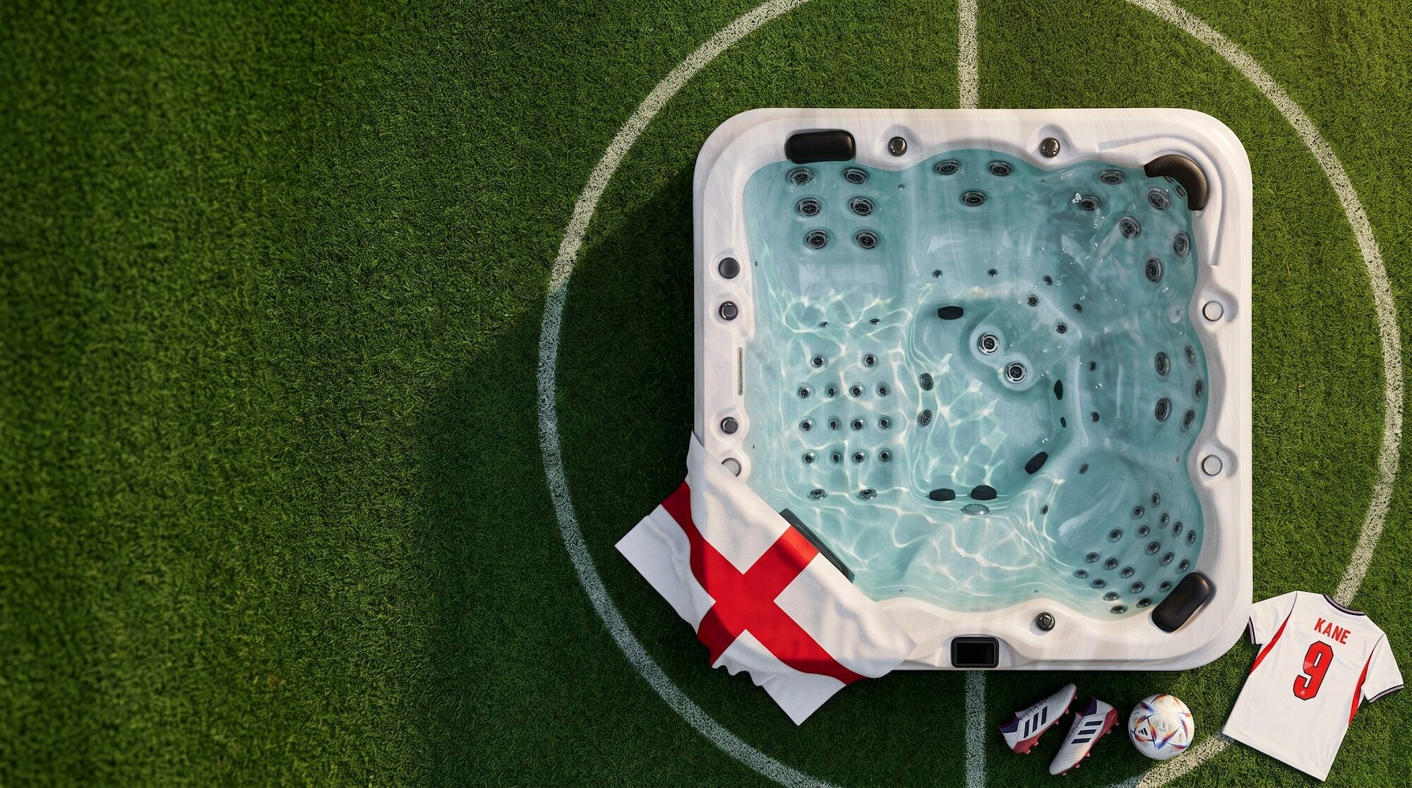 Hot tub on a football pitch at the World Cup