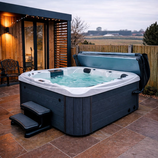 Hot tub on a patio with a scenic background