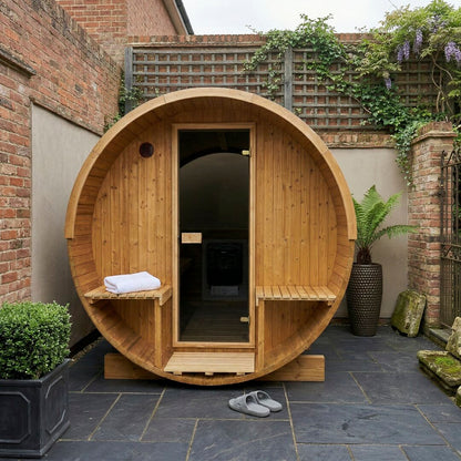 Barrel 250 outdoor sauna in a garden