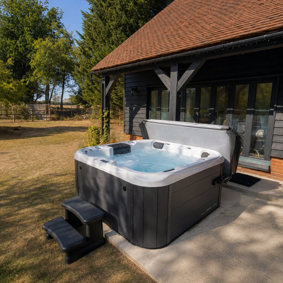 Retreat Plus hot tub on a patio